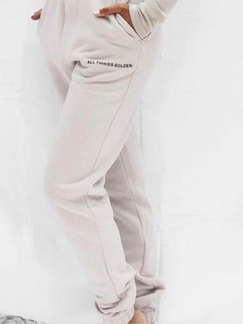 All Things Golden sweats